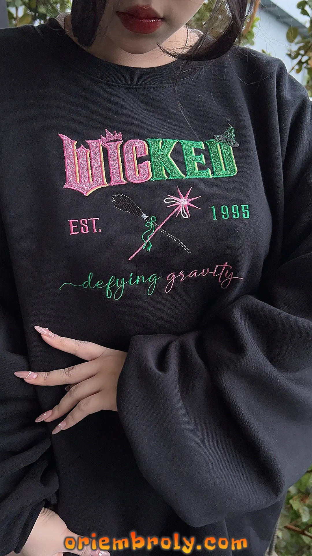 Wicked Musical Embroidered Sweatshirt Pink Green Glitter Bow