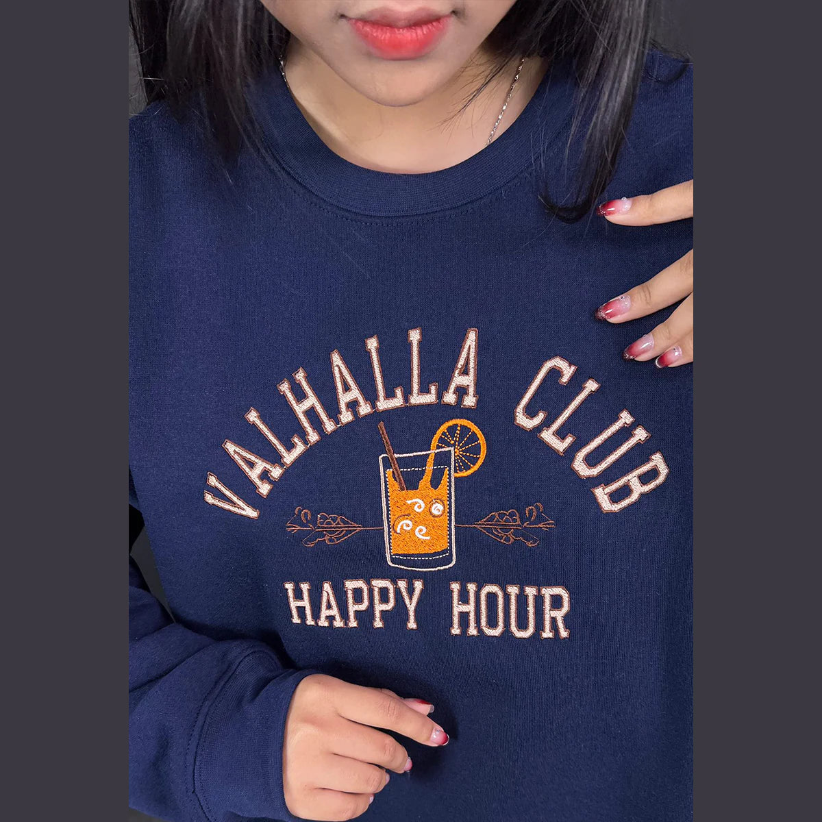 Embroidered book sweatshirt featuring King of Pride design from Valhalla Club by Ana Huang