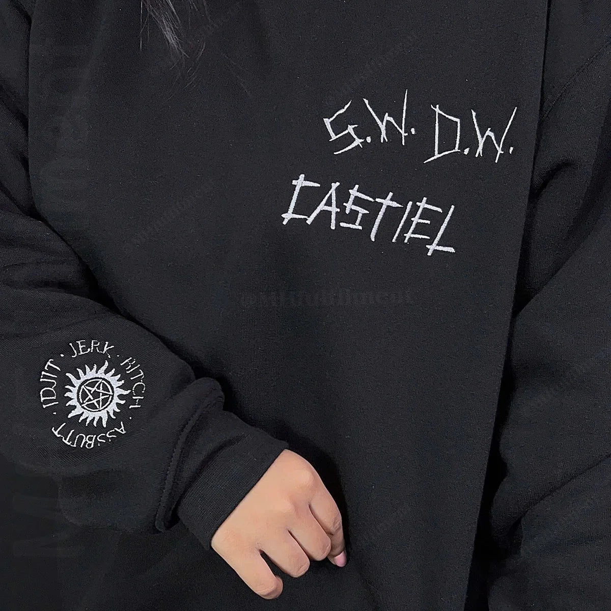 Fanmade embroidered hoodie of Supernatural characters and symbols