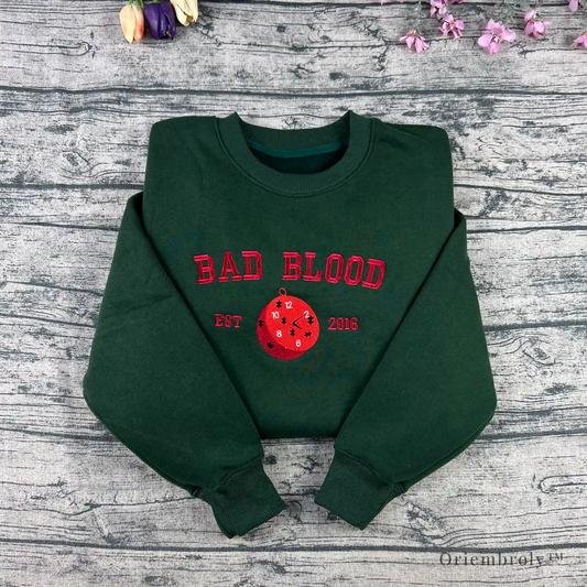 Bad Blood embroidered bookish crewneck sweatshirt pocket watch design
