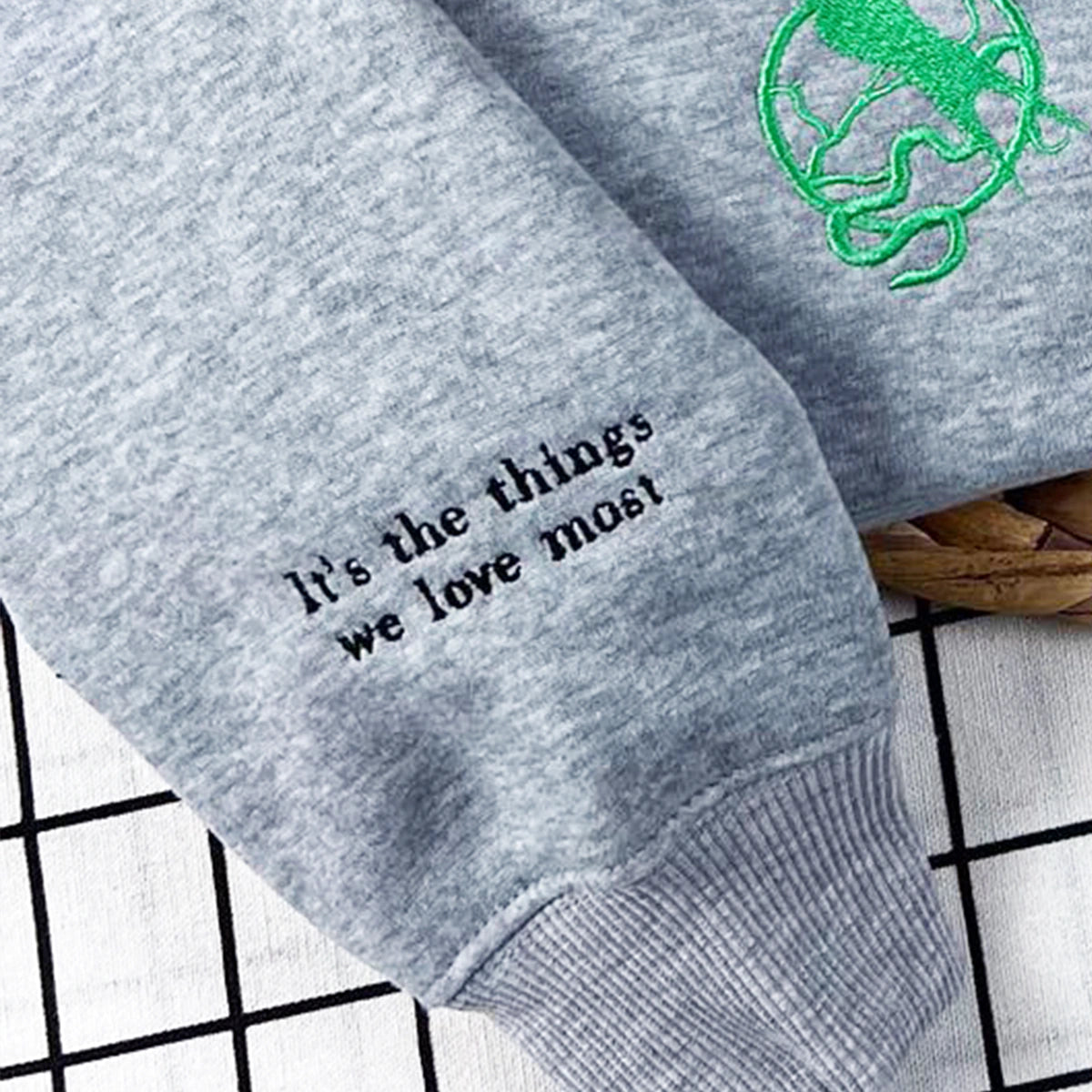 Bookish hoodie with embroidered Mockingjay symbol from The Hunger Games series