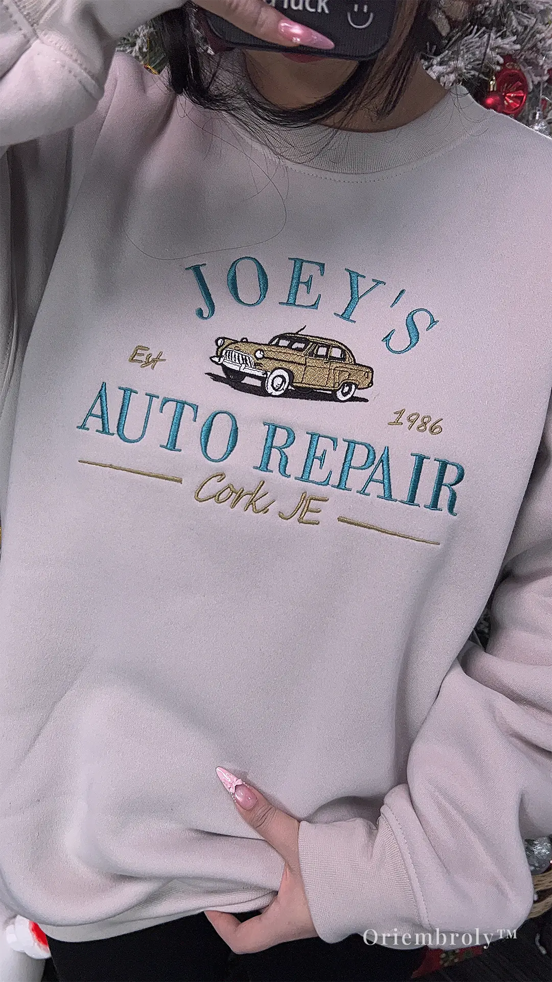 Boys of Tommen Joey’s Auto Repair sweatshirt model