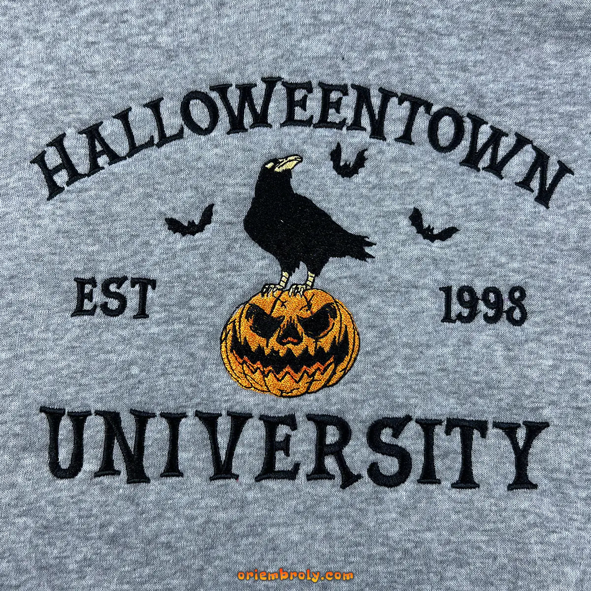 Unisex embroidered Halloween sweatshirt with crow