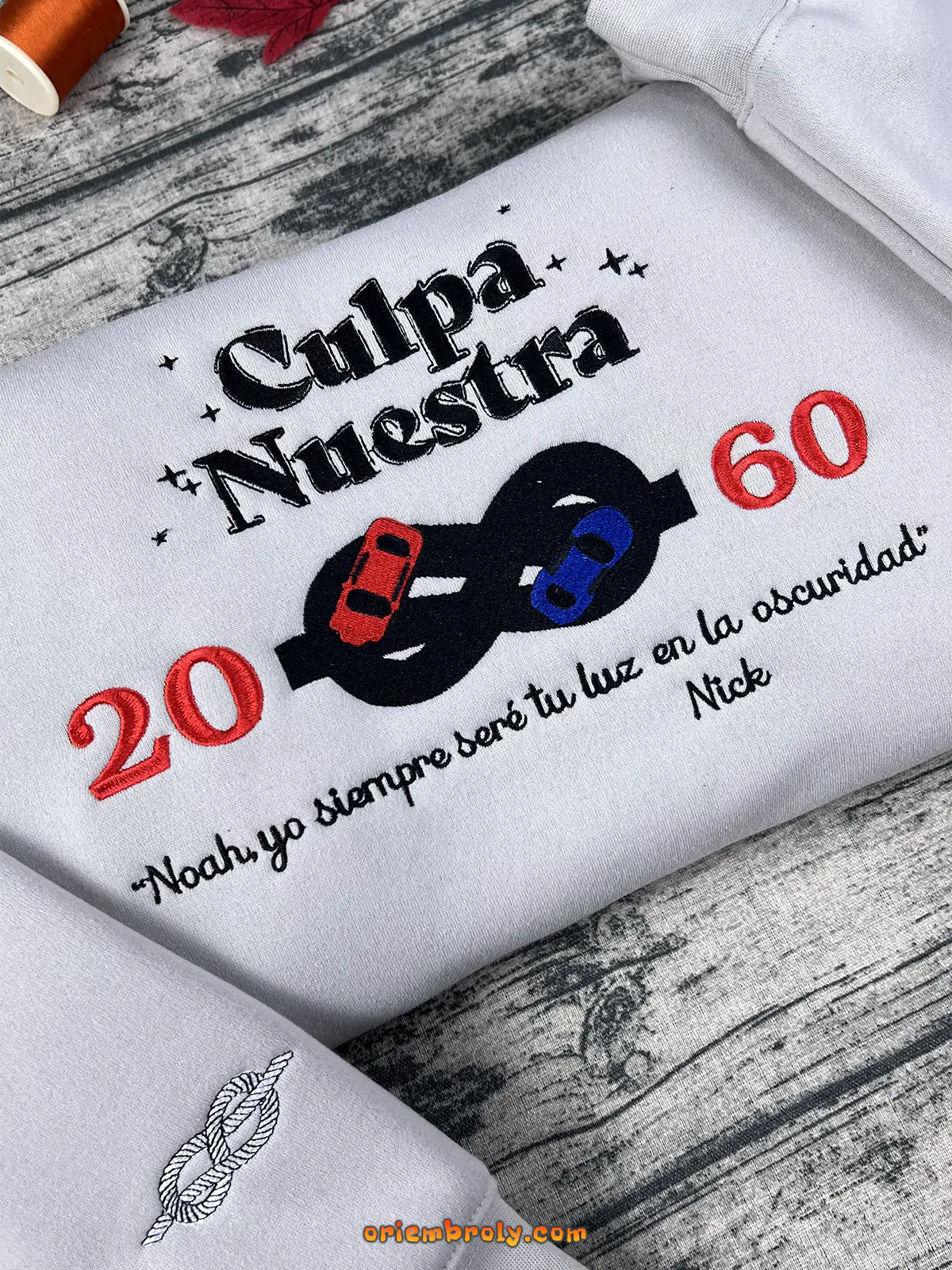 Women’s heavy cotton hoodie with Culpa Nuestra embroidery