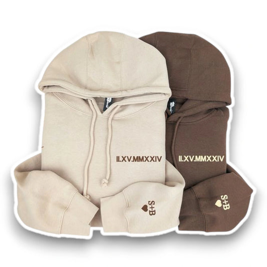 Custom date hoodie with embroidered Roman numerals for Valentineβs Day.