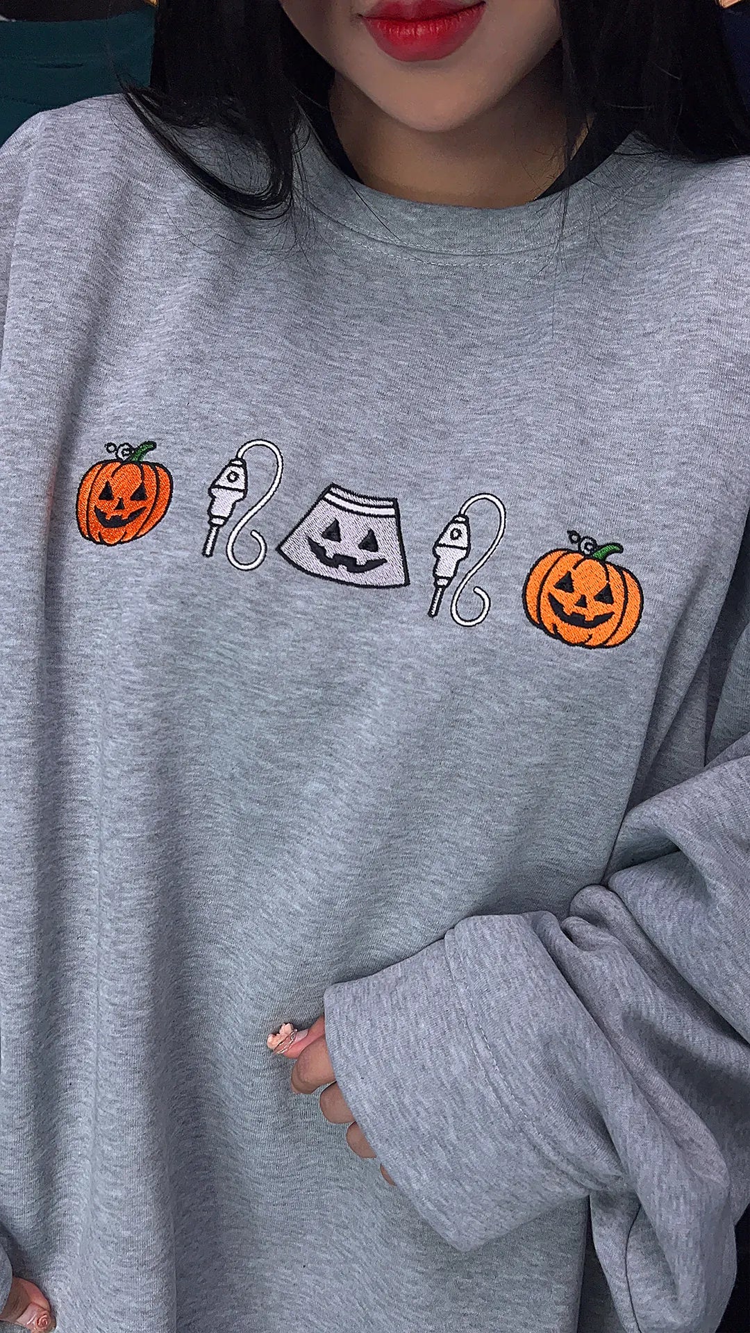 Cute ghost and pumpkin embroidered crewneck – cozy Halloween sweatshirt for fall season