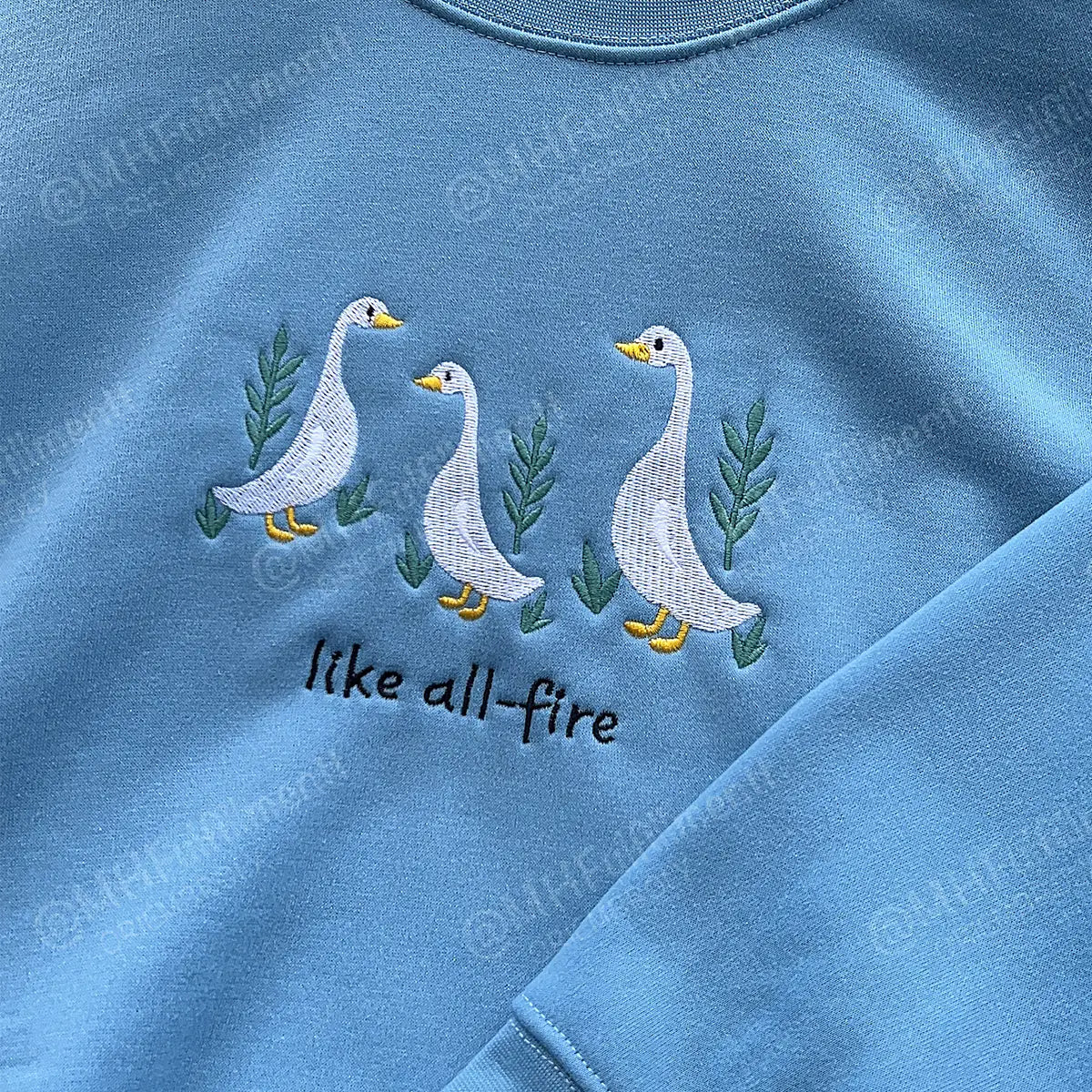 Goose sweatshirt with Sunrise on the Reaping quote