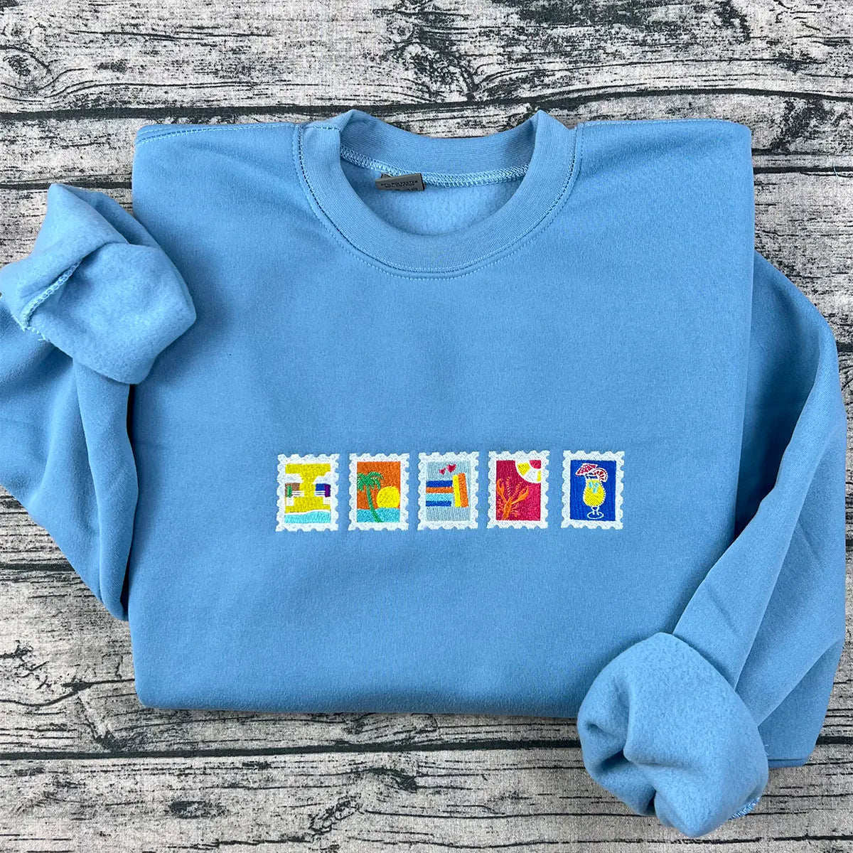 Emily Henry Stamps embroidered sweatshirt, perfect bookish merch for book lovers, featuring funny story and happy place design for book lovers gift.