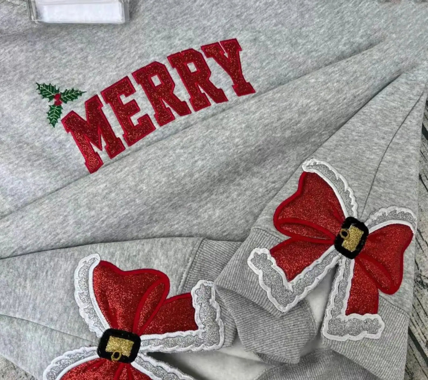 Glitter applique Christmas shirt with festive embroidery detail