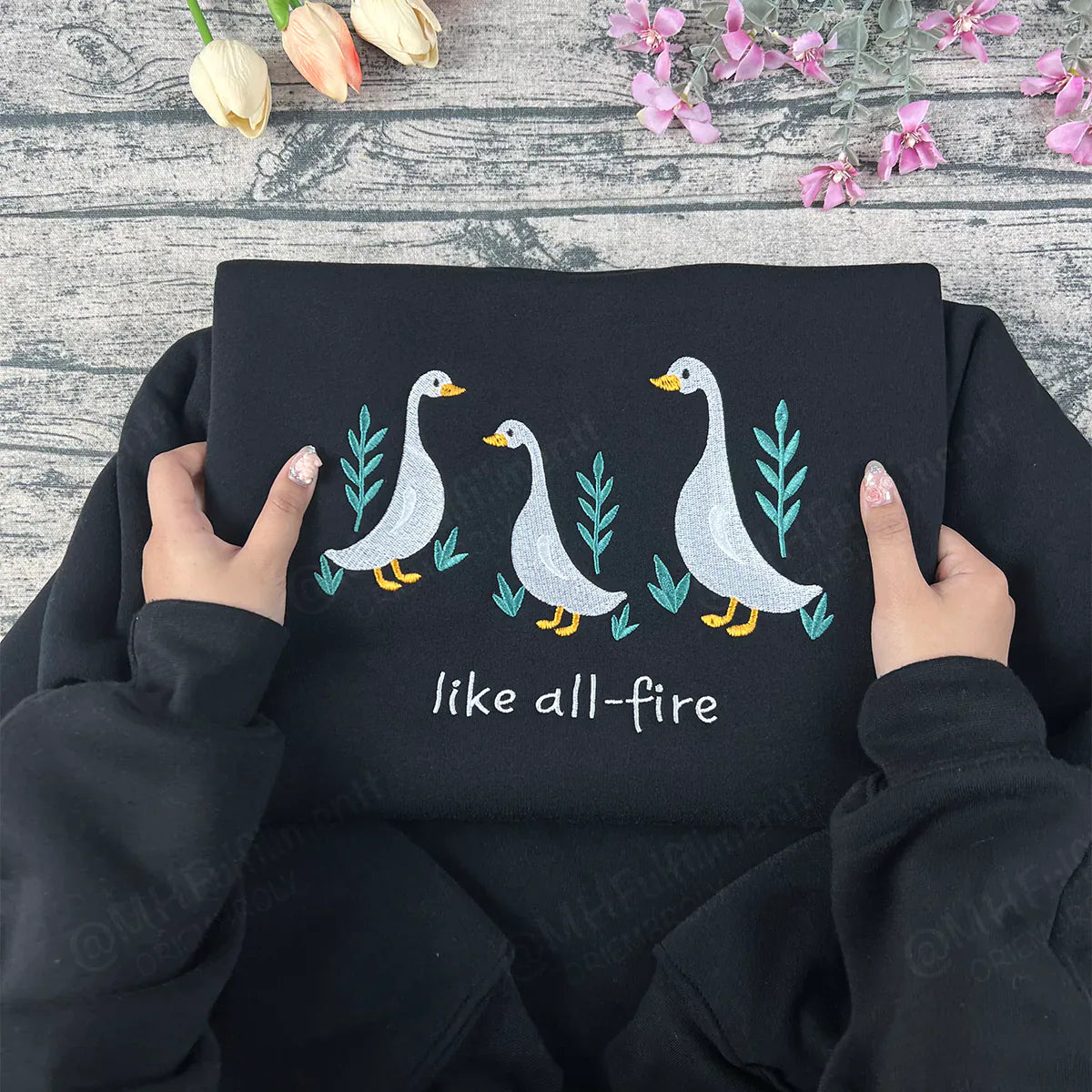 Embroidered crewneck featuring cute goose for book lovers