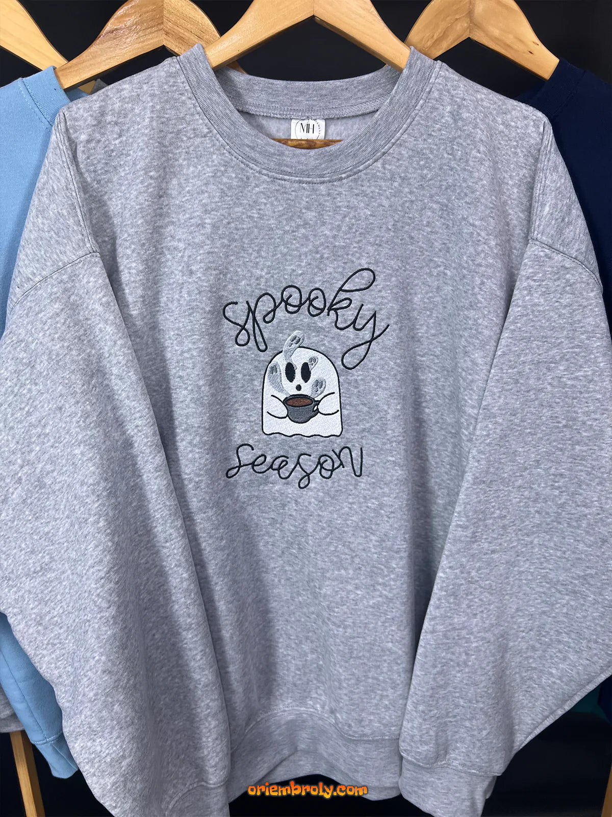 Unisex grey Halloween hoodie with spooky design