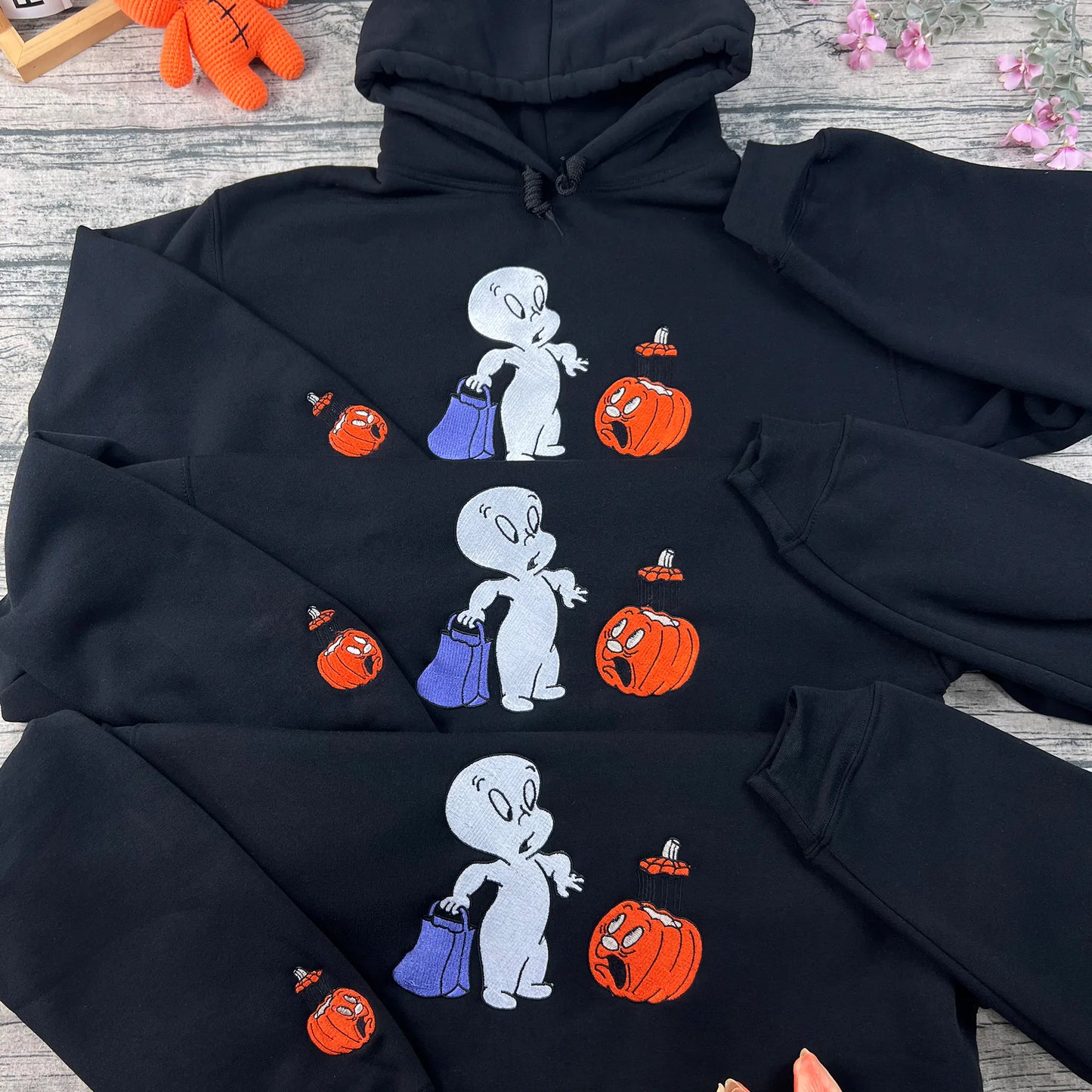 Halloween pumpkin embroidered sweatshirt in cozy orange, perfect for spooky season and autumn outfits.