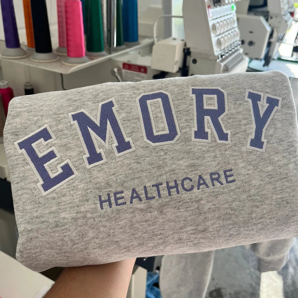 Custom varsity sweatshirt with filled embroidery and personalized design