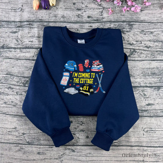 I'm coming to the cottage embroidered hockey crewneck front view