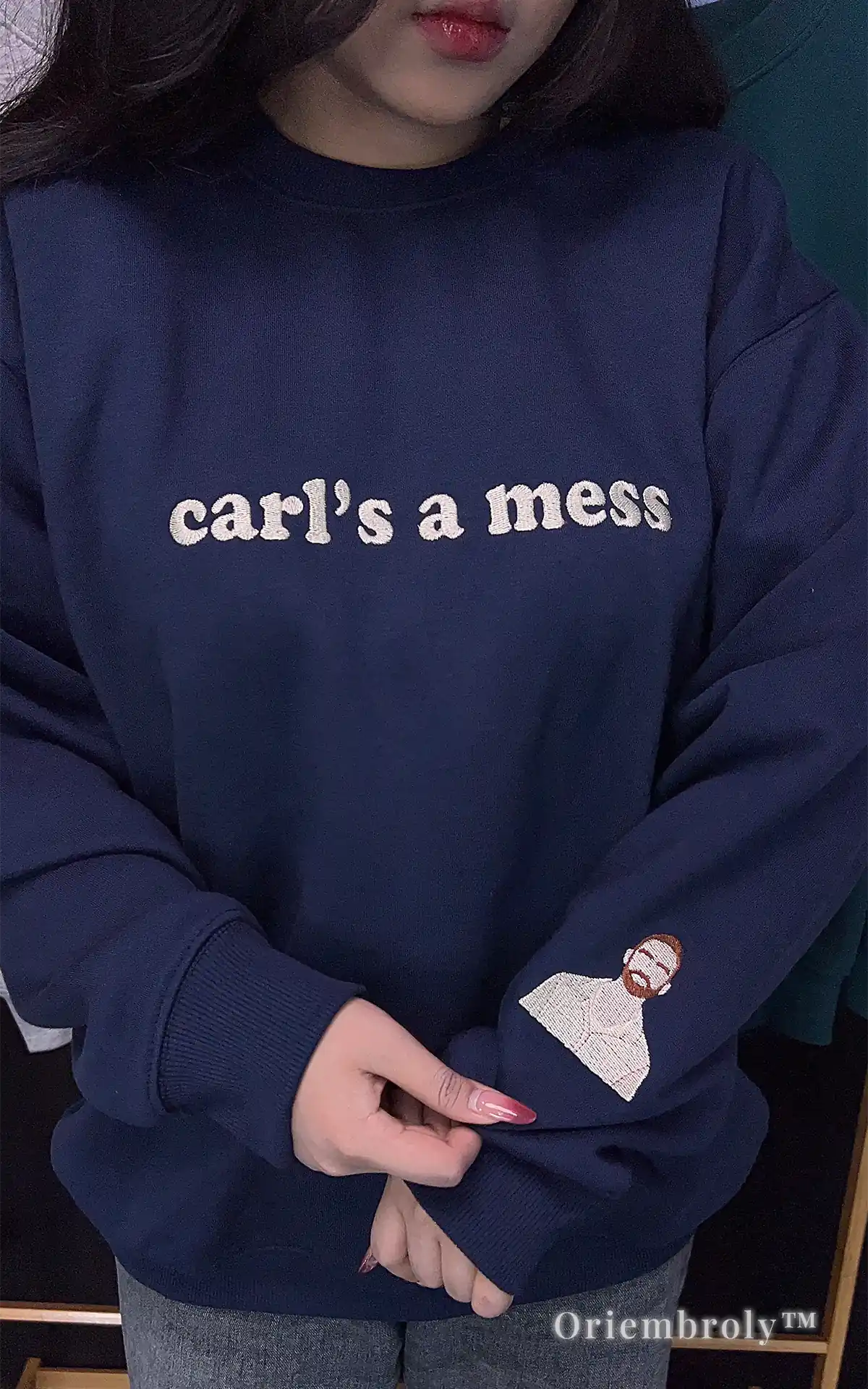 Indie fashion navy blue pullover featuring the viral "carl’s a mess" embroidery. A quirky and niche statement piece for those who appreciate ironical fashion and unique graphic sweatshirts
