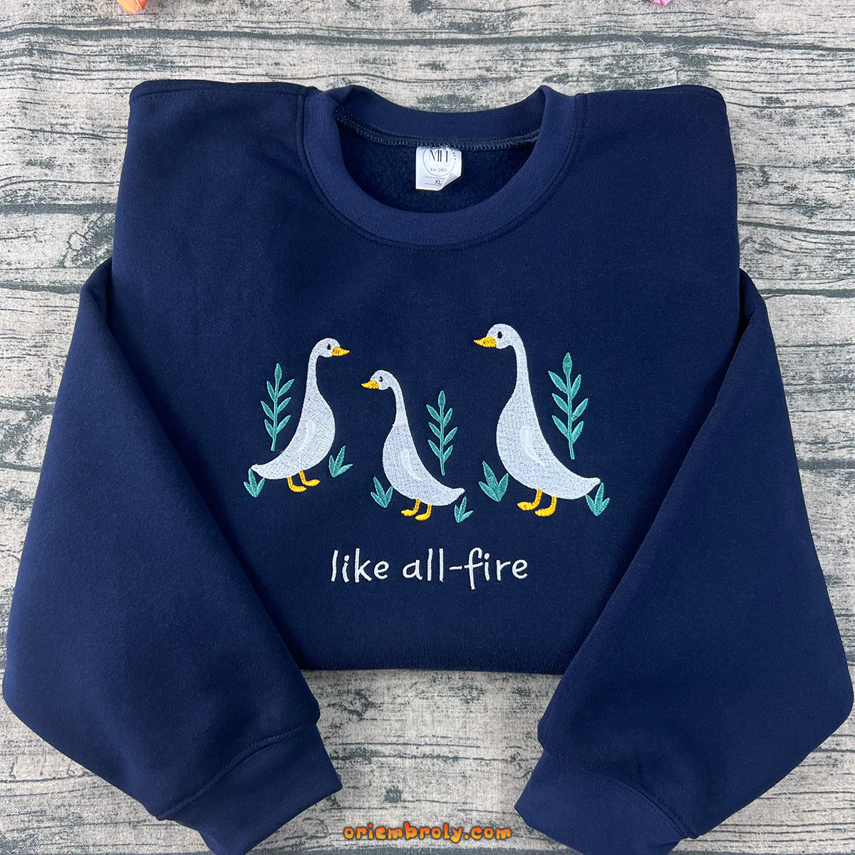 Like All Fire Goose embroidered sweatshirt inspired by The Hunger Games