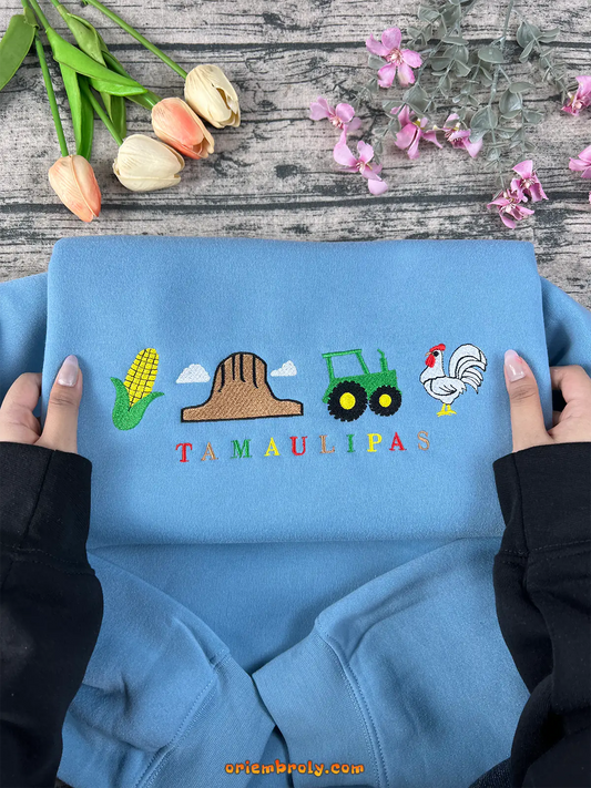 Light blue crewneck with Mexican farm-life embroidery
