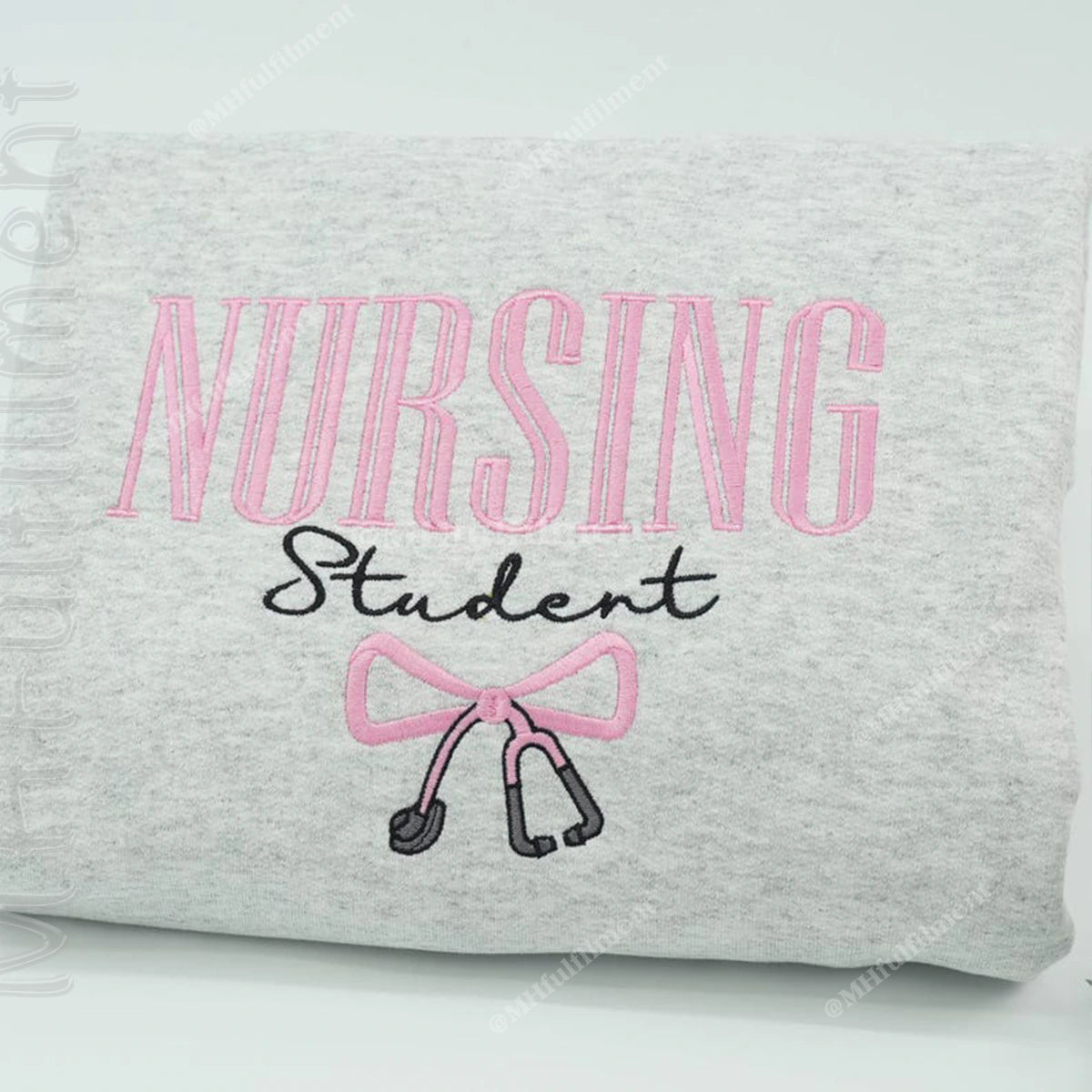 Gray sweatshirt with 'Nursing Student' text and stethoscope graphic on a white background
