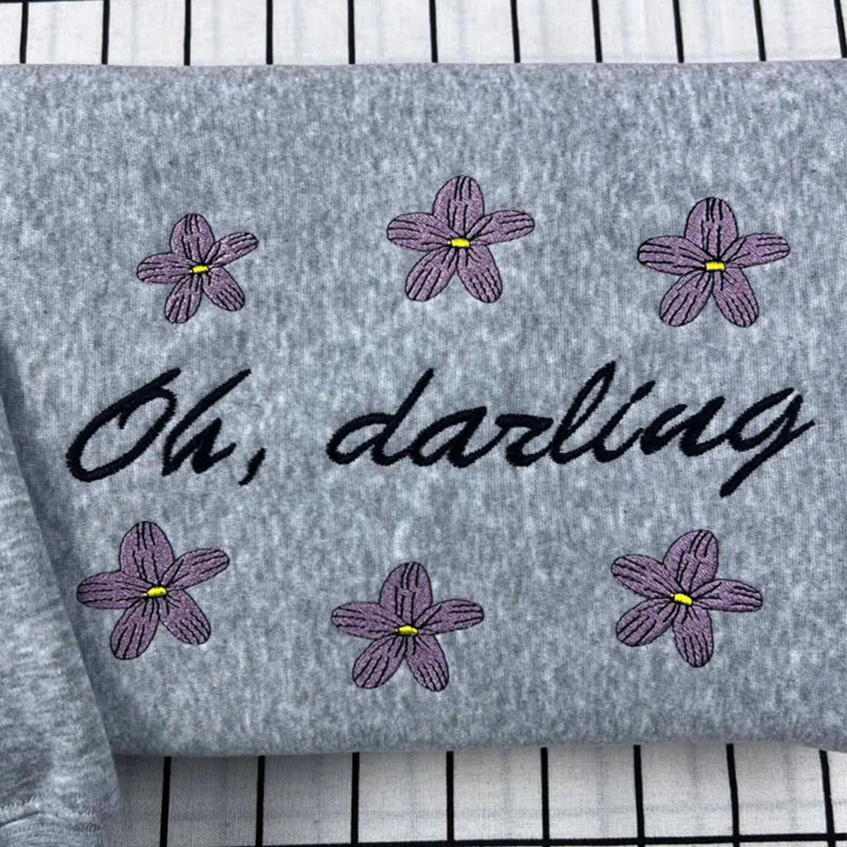 Bookish Oh, Darling embroidered crewneck sweatshirt, romantasy style, Powerless inspired, ideal for fans of Lauren Roberts books.
