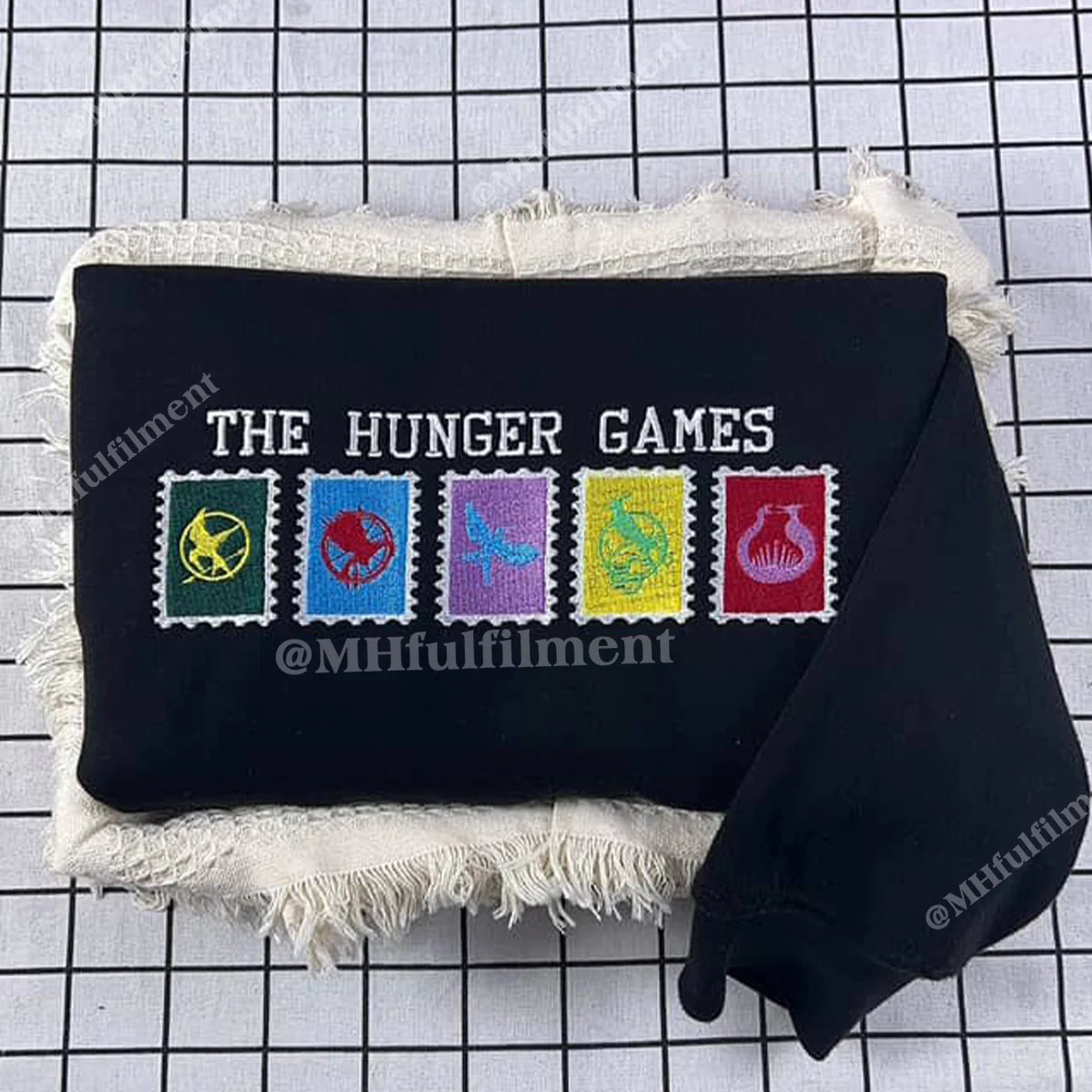 Bookish embroidered sweatshirt for Hunger Games fans