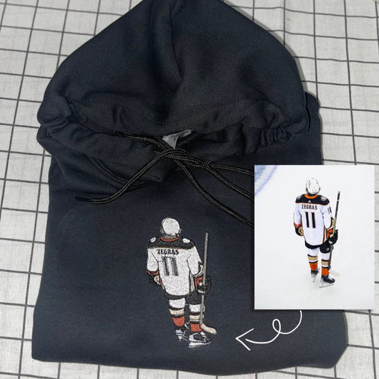 Custom picture embroidered hoodie featuring a unique design