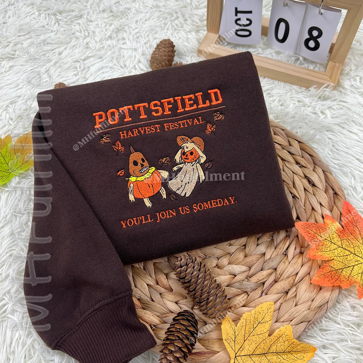 Halloween embroidered hoodie with pumpkin and skeleton art