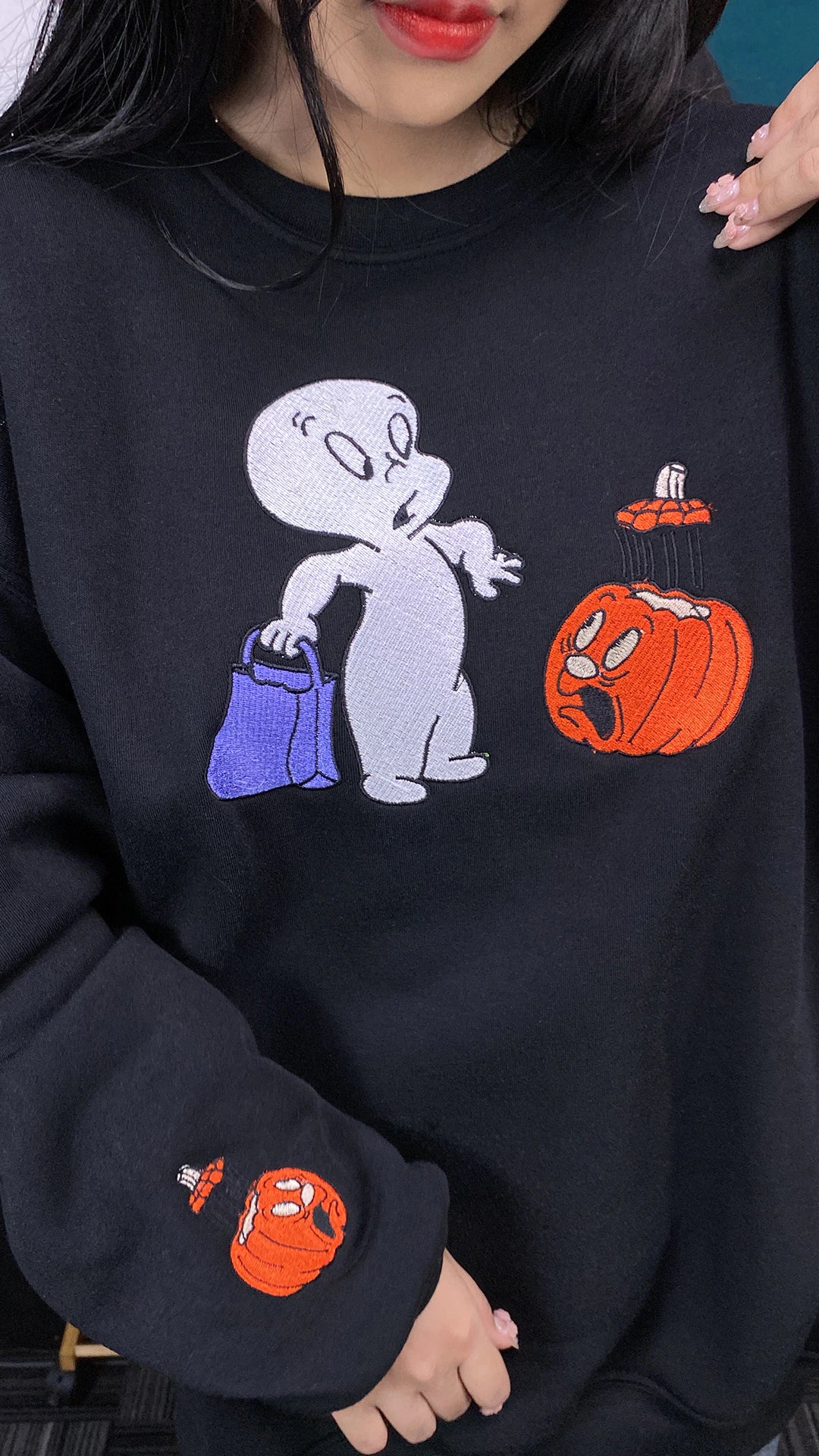 Pumpkin embroidered Halloween sweatshirt – stylish fall sweater for spooky season lovers