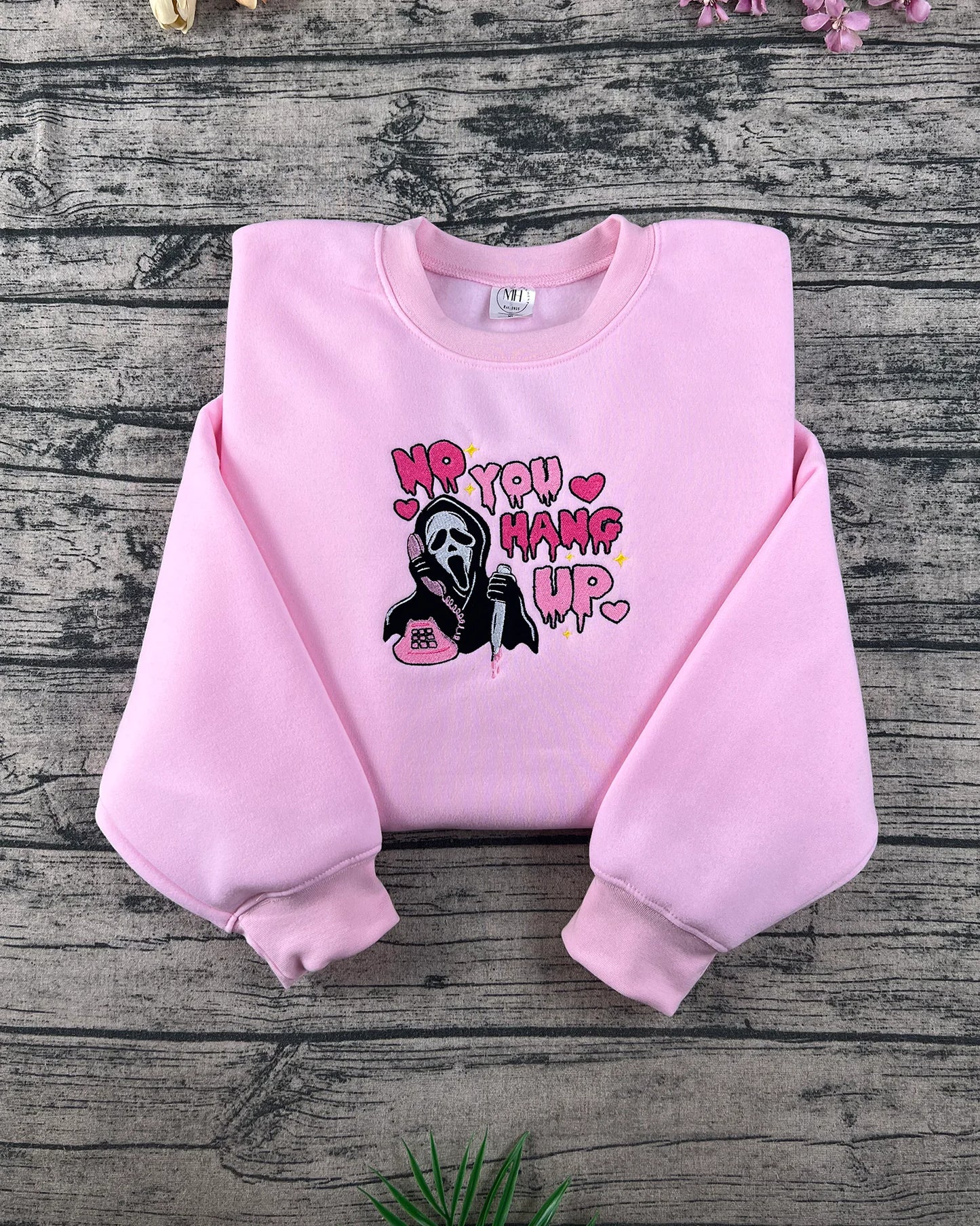 Spooky pink hoodie featuring Scream Ghostface βNo You Hang Upβ Halloween print