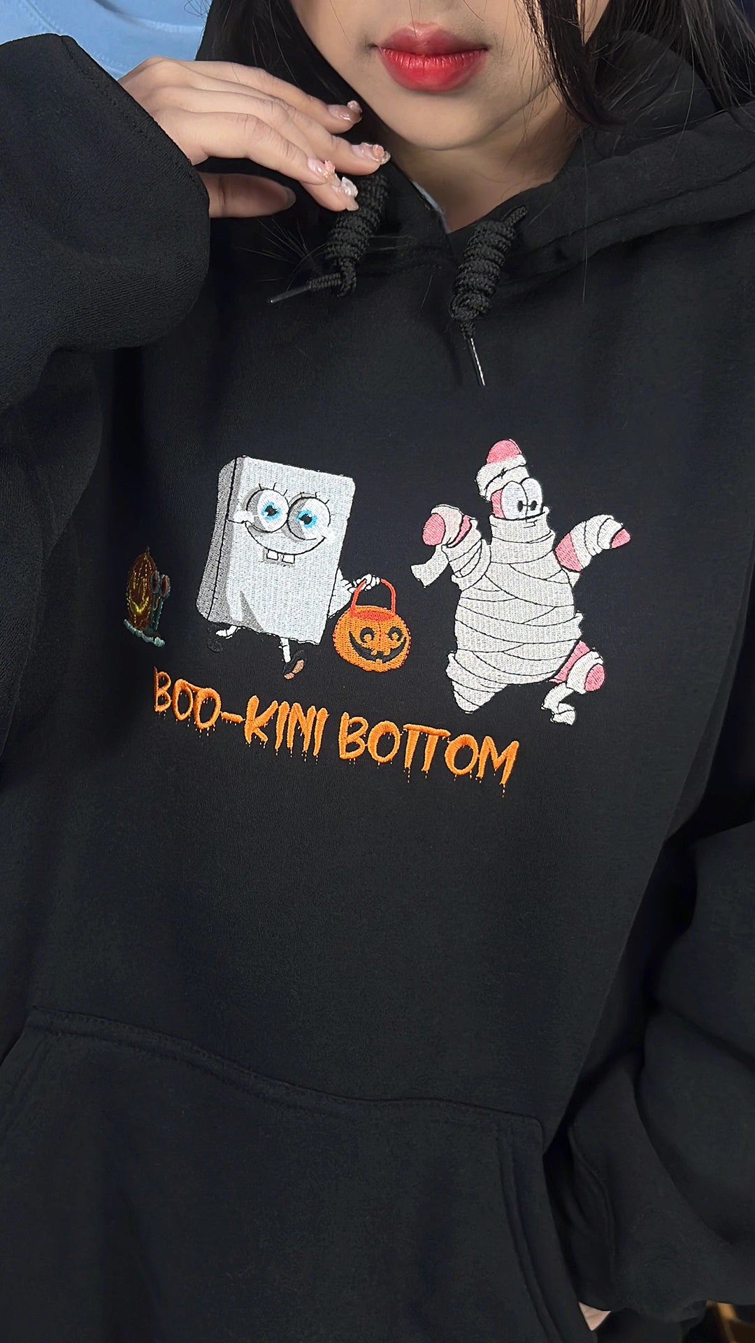 Trendy embroidered Halloween crewneck featuring spooky Sponge design
