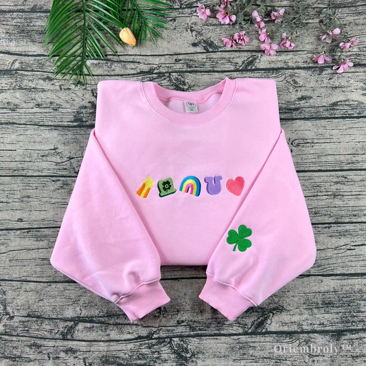 pink embroidered st patricks day sweatshirt with lucky marshmallow icons