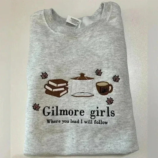 Gray sweatshirt with 'Gilmore girls Where you lead I will follow' text and graphics on a white background