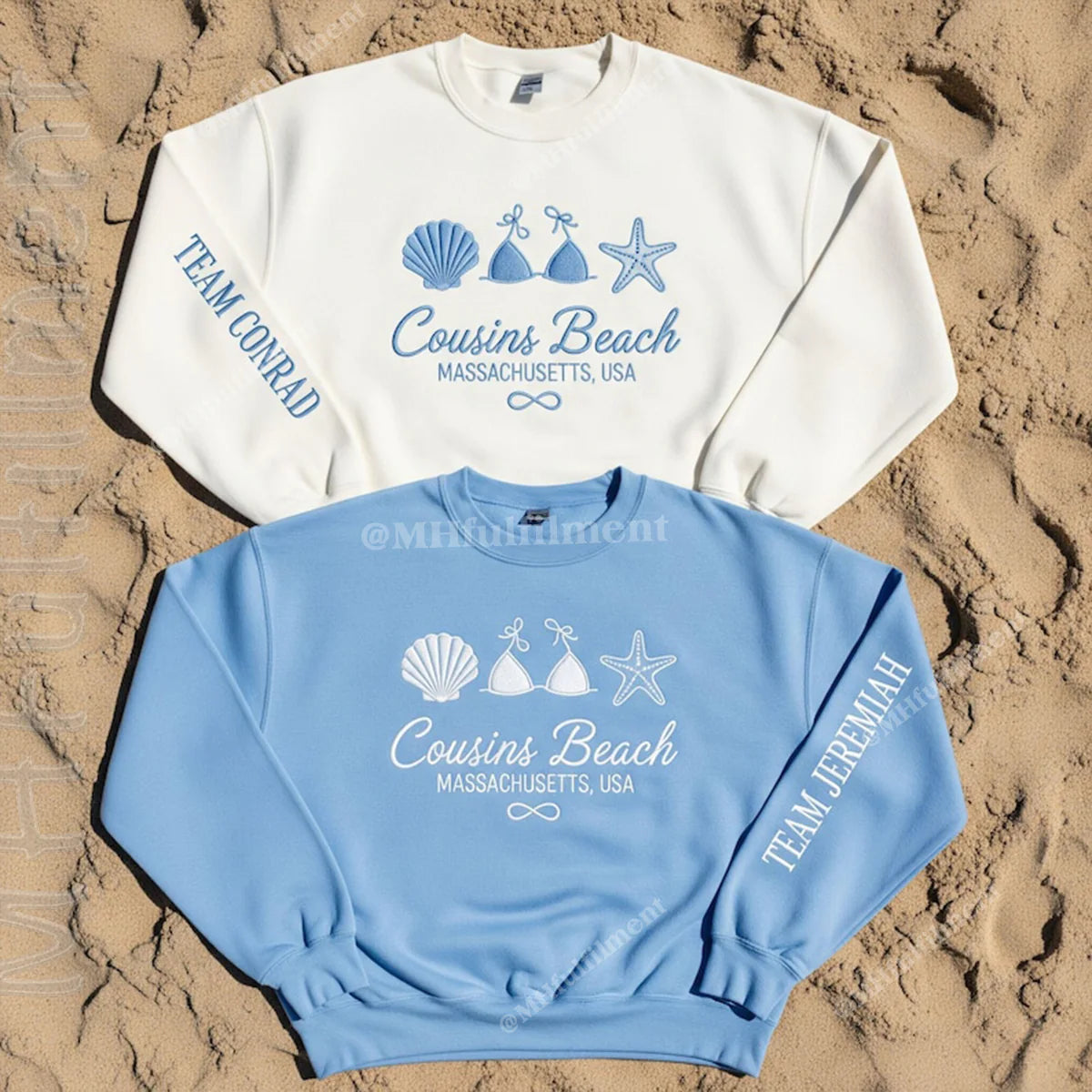 Two sweatshirts with beach-themed designs on a sandy background