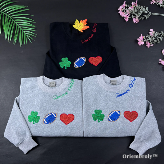 Tommen College varsity embroidered crewneck with shamrock football heart icons