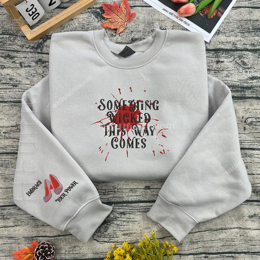 Wicked embroidered hoodie featuring Defying Gravity design