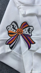 Side Bow Halloween Embroidered Sweatshirt – Vintage Witch Book Crewneck