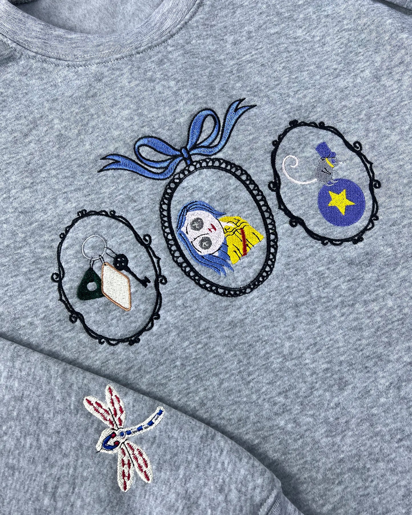 Coraline Embroidered Sweatshirt – Fantasy Keys, Coraline Doll, Cat & Dragonfly Embroidery, Spooky Cute Movie Merch Crewneck