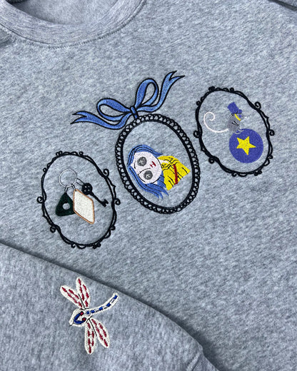 Coraline Embroidered Sweatshirt – Fantasy Keys, Coraline Doll, Cat & Dragonfly Embroidery, Spooky Cute Movie Merch Crewneck