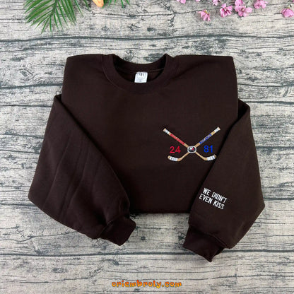 24 and 81 hockey sticks embroidered crewneck sweatshirt