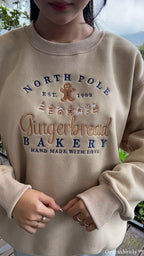 North Pole Gingerbread Bakery Holiday Embroidered Beige Crewneck Sweatshirt