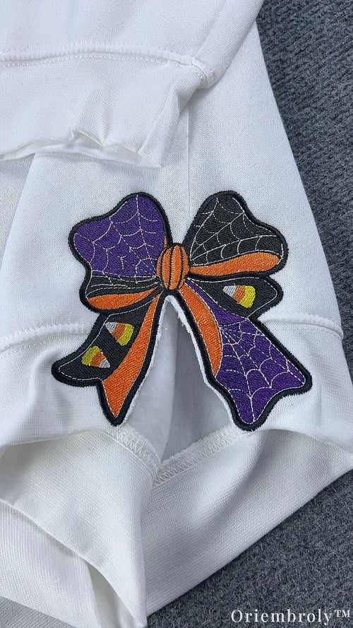 Side Bow Halloween Embroidered Sweatshirt – Vintage Witch Book Crewneck