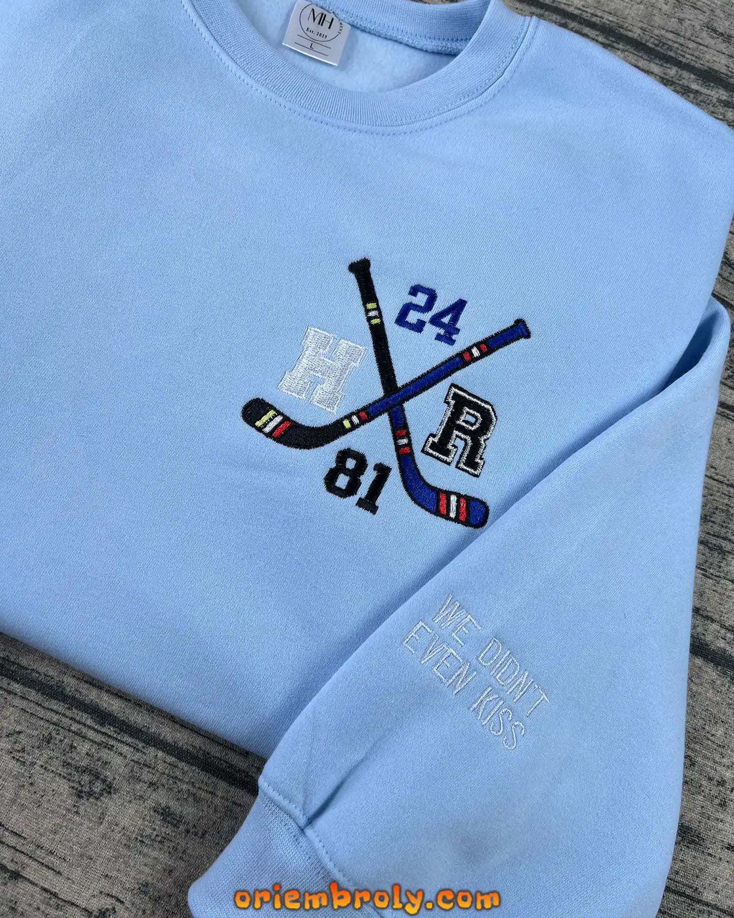 Hockey Sticks Embroidered Hoodie & Crewneck