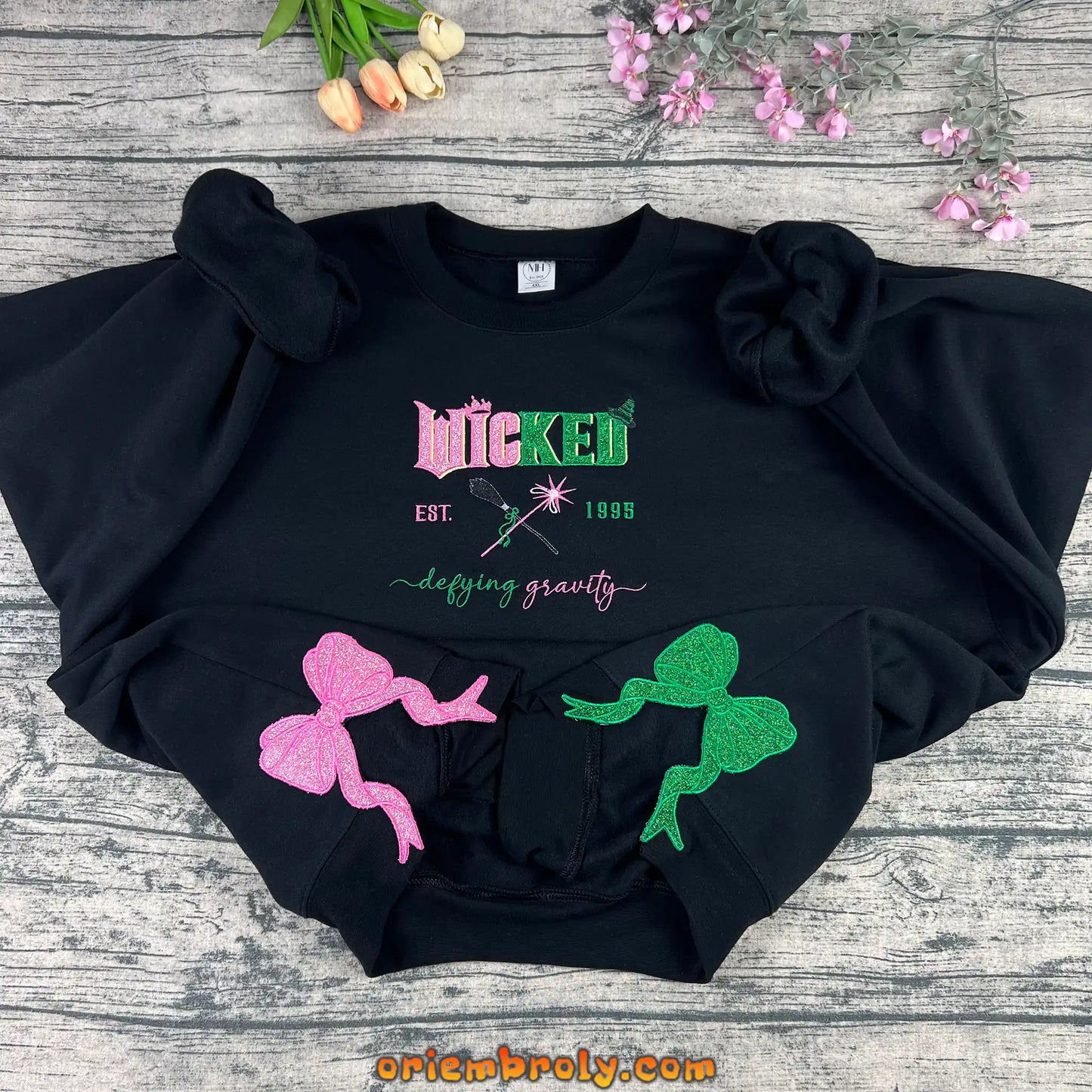 Wicked Musical Embroidered Sweatshirt Pink Green Glitter Bow