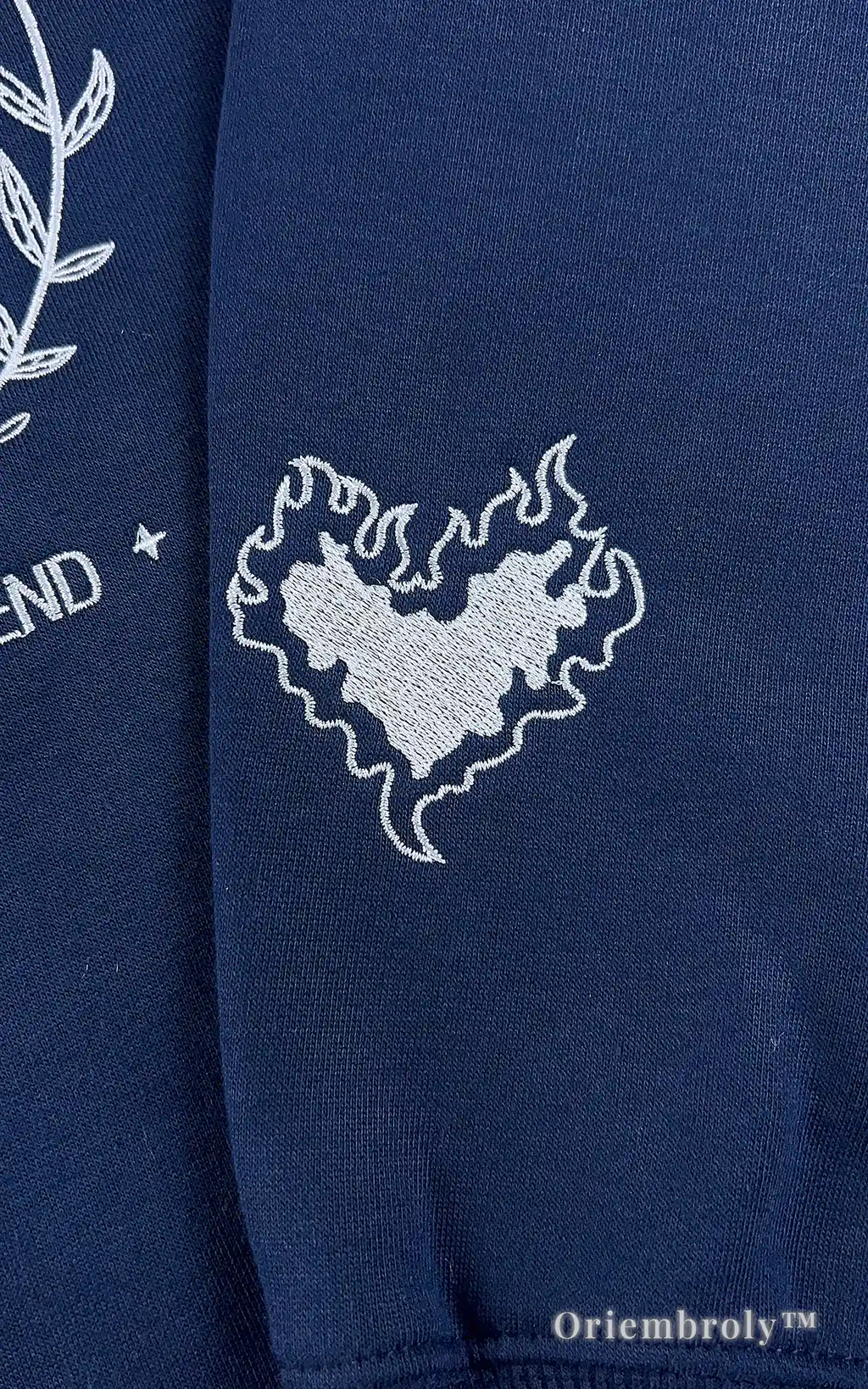 Aesthetic bookish apparel: Navy blue Terrasen pullover with minimalist fantasy book-inspired embroidery