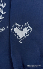Aesthetic bookish apparel: Navy blue Terrasen pullover with minimalist fantasy book-inspired embroidery