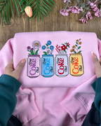 Detailed satin stitch floral soda design