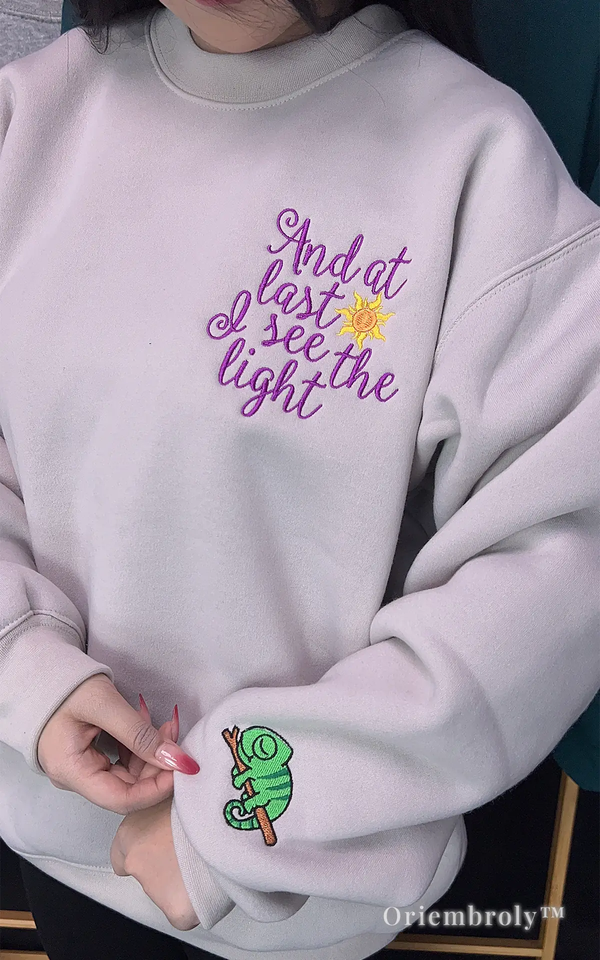 Aesthetic Rapunzel embroidered fleece pullover, perfect for a Disney park outfit.