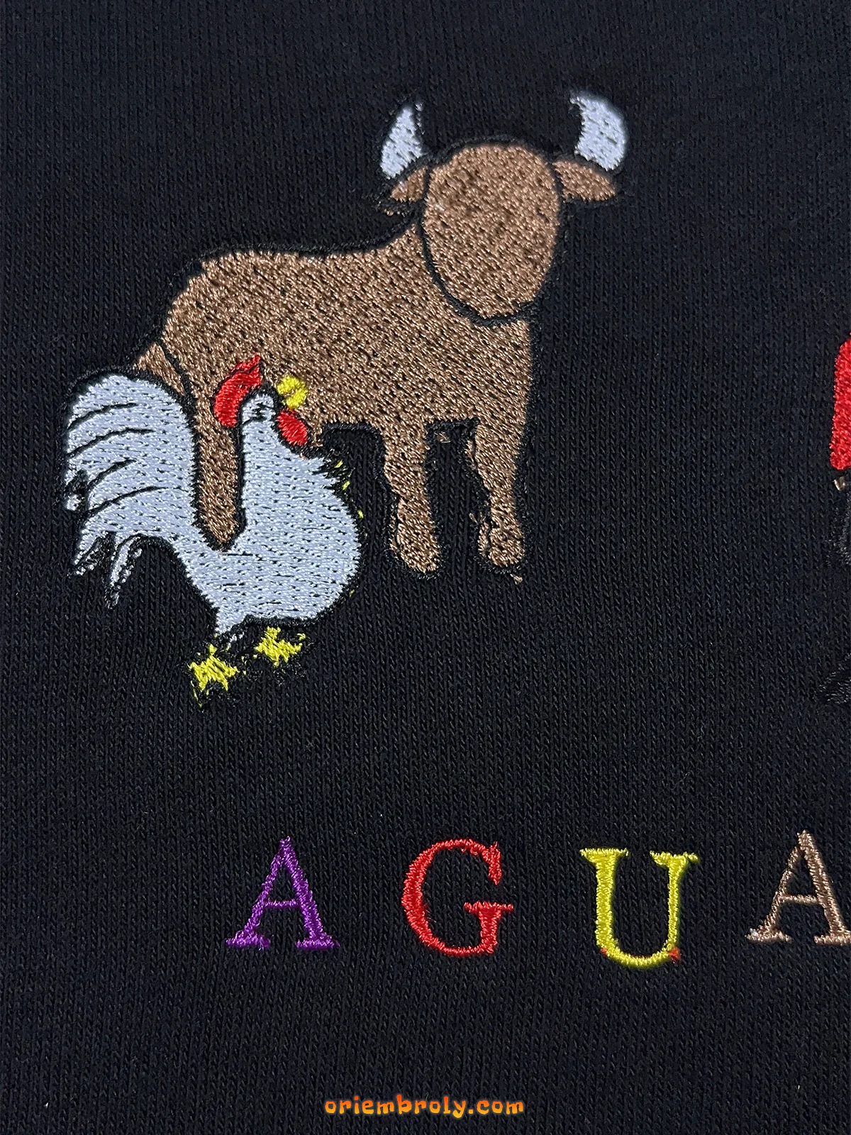 Embroidered bull and rooster symbol from Aguascalientes