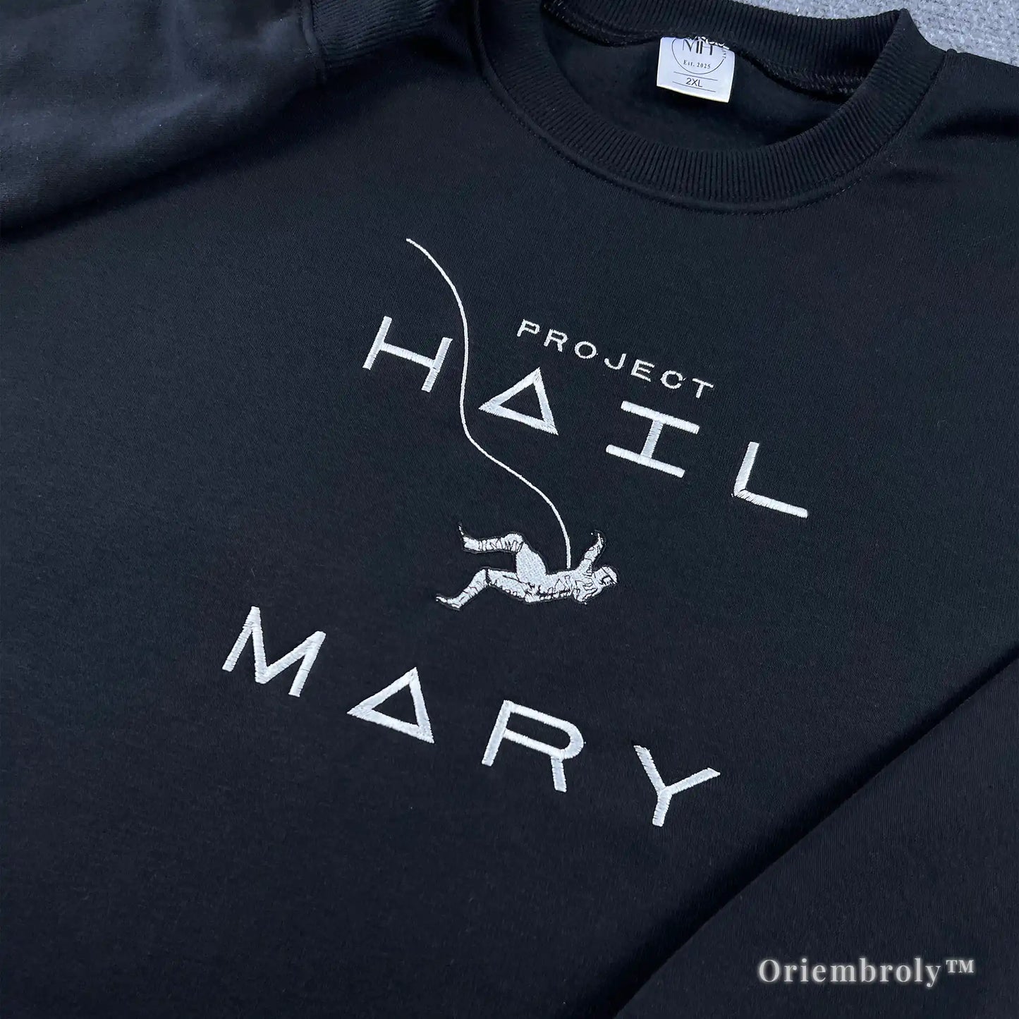Bookish crewneck sweater for Project Hail Mary fans featuring high-quality white astronaut embroidery