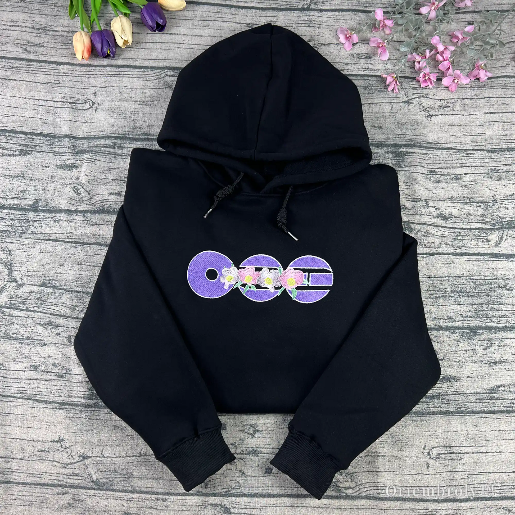 Arirang 2026 comeback embroidered floral hoodie front view