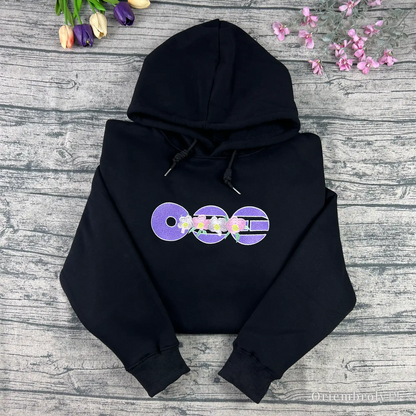 Arirang 2026 comeback embroidered floral hoodie front view